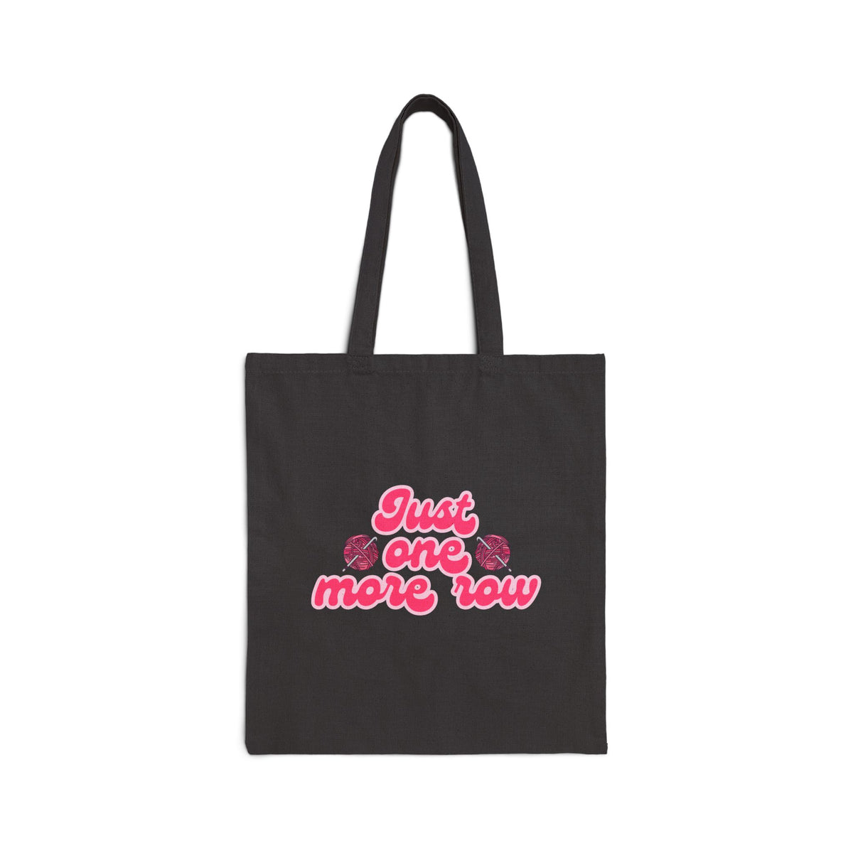Black tote bag with pink text 'Just one more row' on a white background