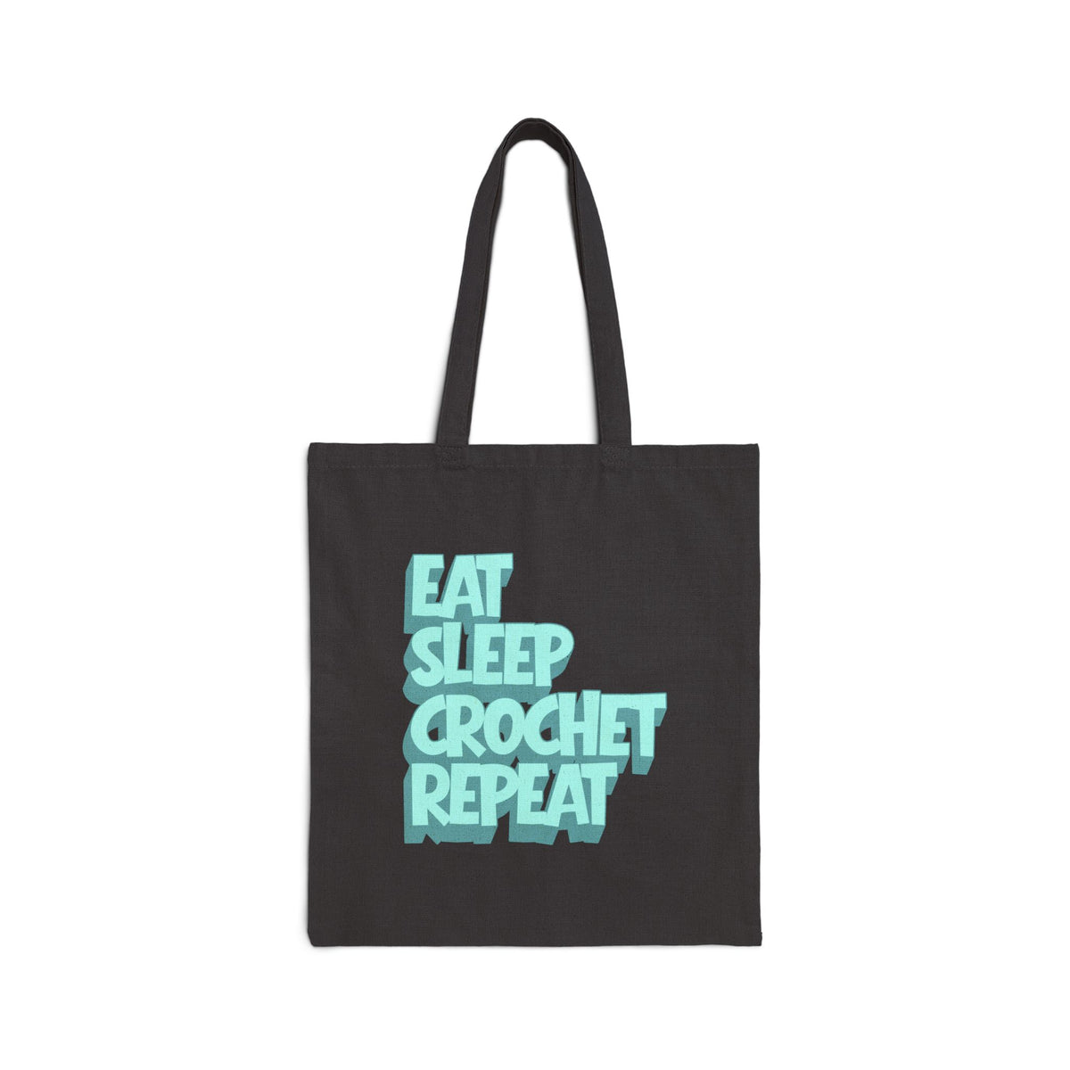 Black tote bag with 'Eat Sleep Crochet Repeat' text in teal on a white background
