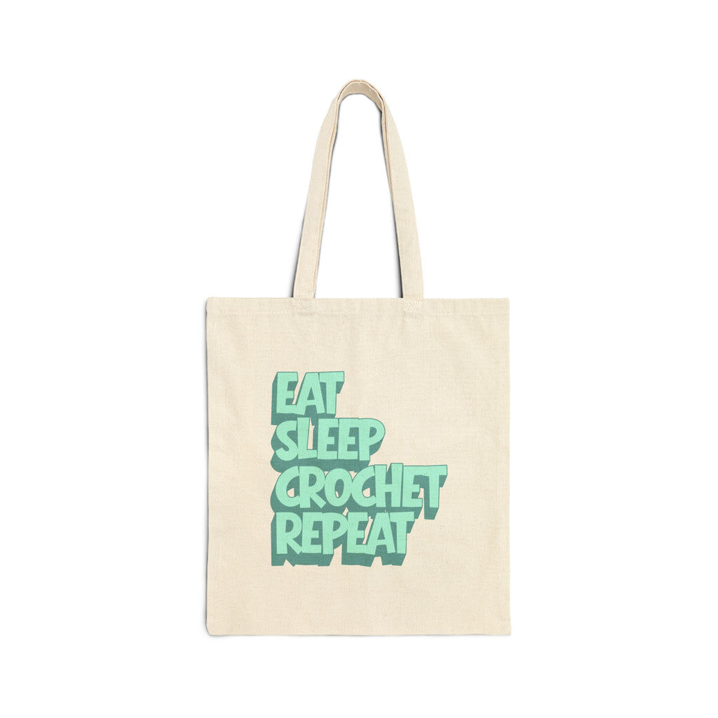 Beige tote bag with 'Eat Sleep Crochet Repeat' text in green on a white background