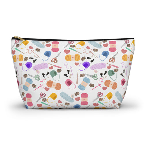 Pouch with yarn and knitting tools pattern on a white background
