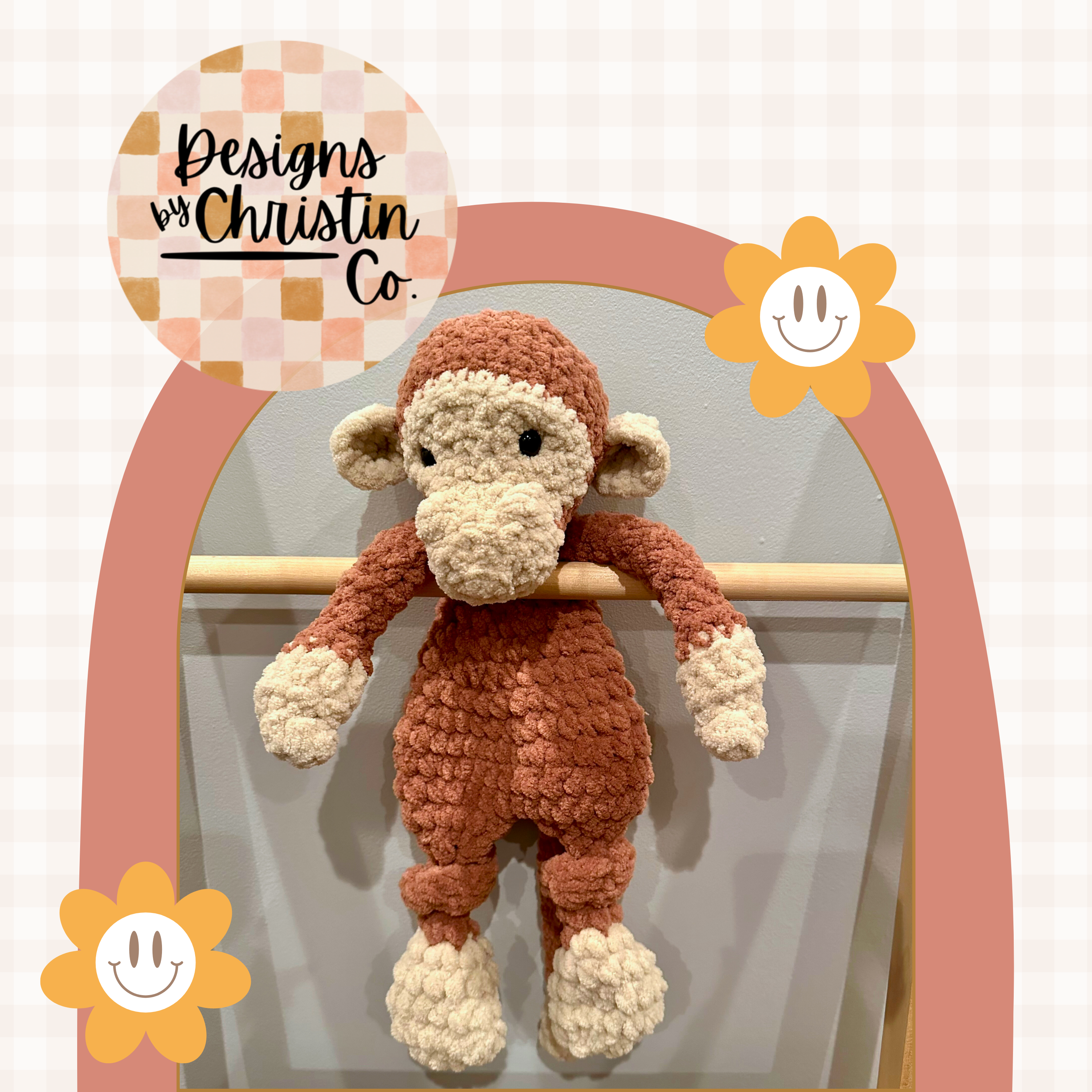 A crochet plush monkey lovey with a stuffed head and an unstuffed body.